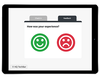 A photo of an iPad with a a smile icon for positive feedback and a frown icon for negative feedback